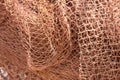 Orange fishing net. Close up pattern