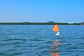Orange flag embroidered in the sea