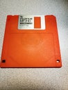 Orange floppy disk Royalty Free Stock Photo