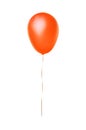 Orange flying balloon isolated on white Royalty Free Stock Photo