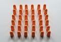 Orange foam ear plugs isolated on white background Royalty Free Stock Photo