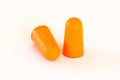 Foam ear plugs on white Royalty Free Stock Photo