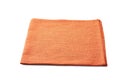 Orange folded textile napkin on white background Royalty Free Stock Photo