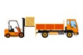 Orange forklift loading truck.