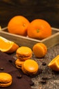 Orange French Macarons with Dark Chocolate and Coffee Filling