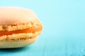 Orange French Macaroon On Blue