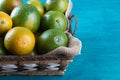 Orange fruit in the basket. Tropical fruits. Copy space