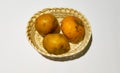 Orange fruit on rattan basket Royalty Free Stock Photo