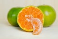 Orange fruit with half view isolated on wood background