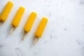 Orange fruit ice isolated on a white background. Stick ice cream Royalty Free Stock Photo