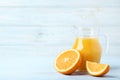 Orange fruit with jug of juice Royalty Free Stock Photo