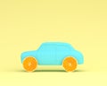 Orange fruit layout wheel and car blue on pastel yellow background. minimal idea food and fruit concept. Idea creative to produce Royalty Free Stock Photo