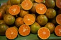 Orange fruit in a market, Slices of tangerines