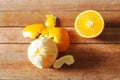 Orange fruit and slice on wooden table