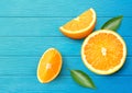 Orange fruit with sliced on blue wood Royalty Free Stock Photo