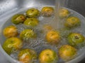 The Orange fruit soaks and wash in the water Royalty Free Stock Photo