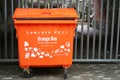 Orange garbage can Royalty Free Stock Photo