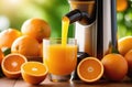 juicer squeezes orange juice into a glass on a wooden table, on the background of a plantation of orange trees to