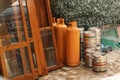 Orange gas cylinders are on the street, Large gas cylinders. Flammable containers with fuel