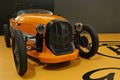 Orange gasoline version of stylish retro looking microcar roadster Patak Rodster, designed by company Patak