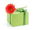 Orange gerbera flower over gift box Royalty Free Stock Photo