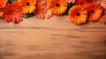 Colorful Woodcarvings: Orange Gerberas Flowers On Wood Background