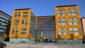 Orange and glass facade of building. Modern architecture. Skyscraper geometry. Business office park. Urban real estate. Economics Royalty Free Stock Photo