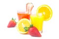 Orange, glass of orange juice, strawberries and strawberry juice Royalty Free Stock Photo