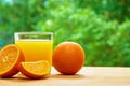 Orange and glass on the table