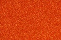 Orange glitter sparkle. Background for your design. Royalty Free Stock Photo