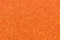 Orange glitter texture abstract background