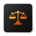 Orange glowing neon Scales of justice icon isolated on white background. Court of law symbol. Balance scale sign. Black Royalty Free Stock Photo