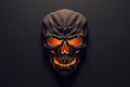 an orange glowing skull on a black background