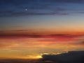 Moon on night sky gold sunset sunbeam ,dramatic fluffy clouds at evening sky  and green grass on field  nature lands Royalty Free Stock Photo