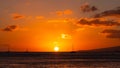 Orange and golden sunset at Waikiki Beach Hawaii Royalty Free Stock Photo