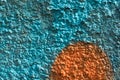 Orange graffiti detail on a blue painted wall, facade. Abstract background, wallpaper. Royalty Free Stock Photo