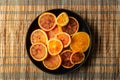 Orange and grapefruit halves in bowl Royalty Free Stock Photo