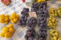 Orange and grapes for sale at a street bazaar in Croatia
