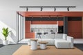 Orange and gray living room and kitchen interior Royalty Free Stock Photo