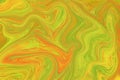 Orange green liquid paint abstraction. Marbled texture for autumn seasonal graphic design Royalty Free Stock Photo