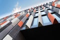 Orange, grey and white brise soleil sun breakers office building Royalty Free Stock Photo