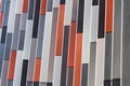 Orange, grey and white brise soleil sun breakers office building Royalty Free Stock Photo