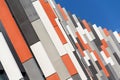 Orange, grey and white brise soleil sun breakers office building Royalty Free Stock Photo