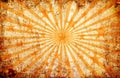 Orange grunge background with sun rays and stars Royalty Free Stock Photo