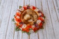 Orange handmade flower circle for newborn babies with fox fur in Royalty Free Stock Photo