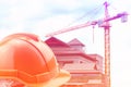 Orange hard hat on construction site Royalty Free Stock Photo