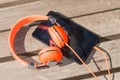Orange headphones and tablet pc