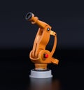 Orange heavyweight robotic arm on black background Royalty Free Stock Photo