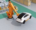 Orange heavyweight robotic arm carrying white SUV in the assembly factory Royalty Free Stock Photo