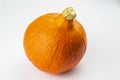 Orange Hokaido pumpkin on white background Royalty Free Stock Photo